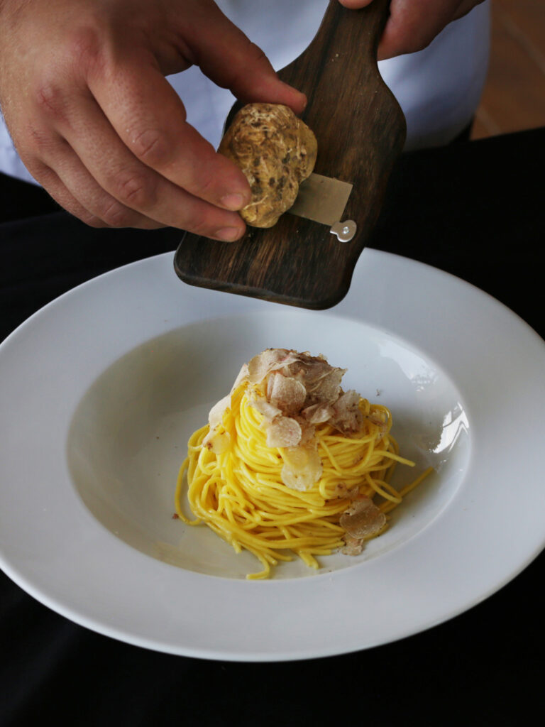 Grated truffle on pasta