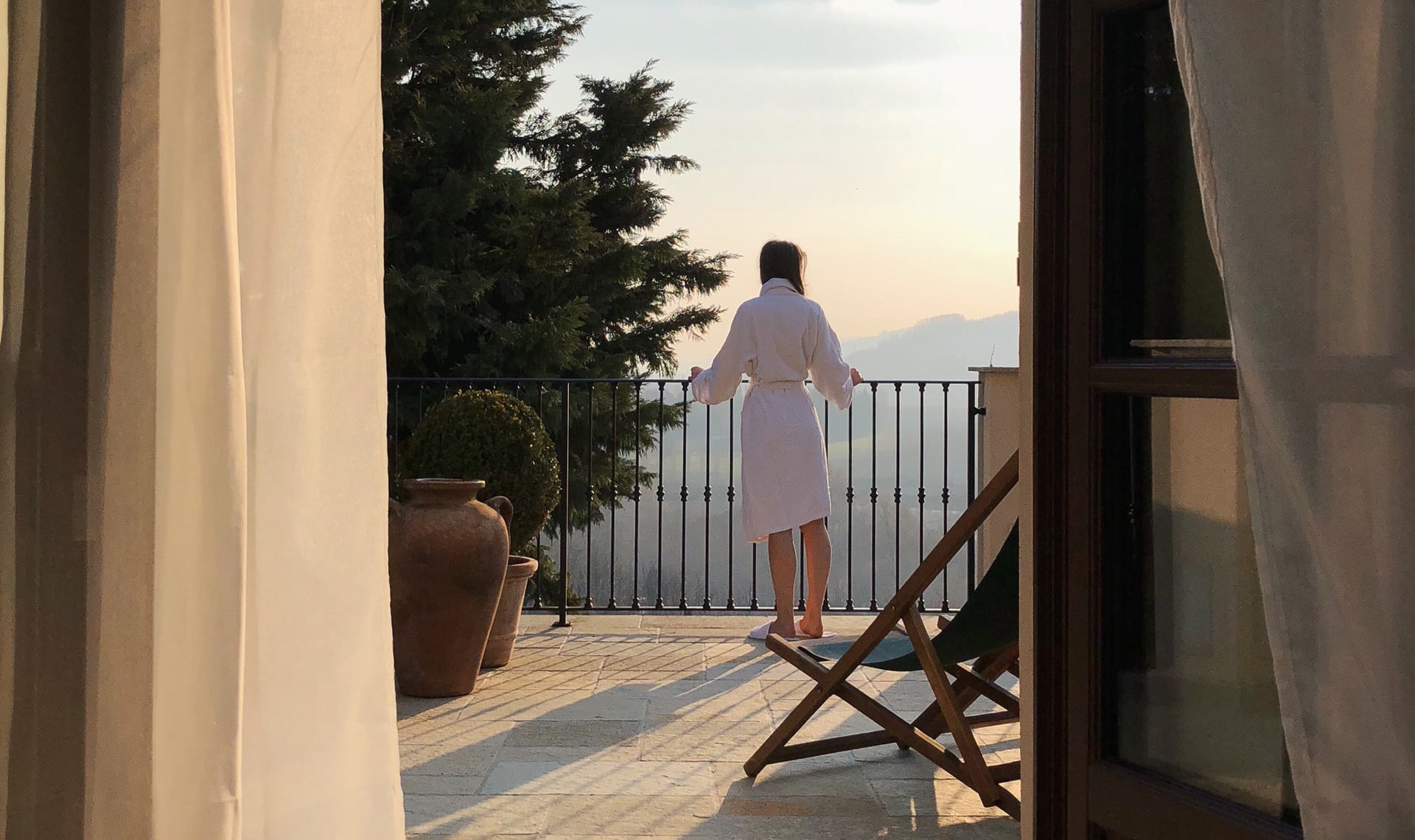 Girl on sunny balcony