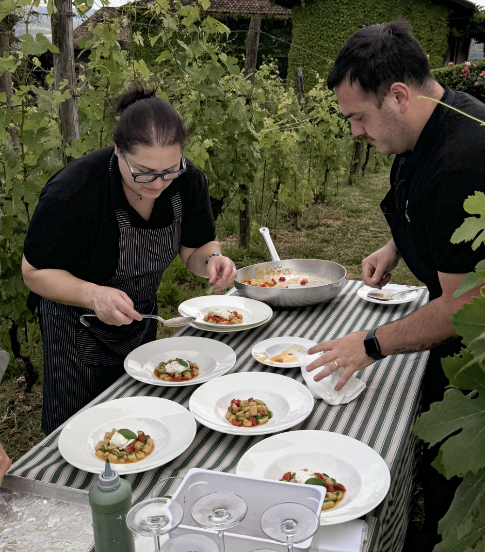 meetings-o-events_plating-2 Two people preparing lunch
