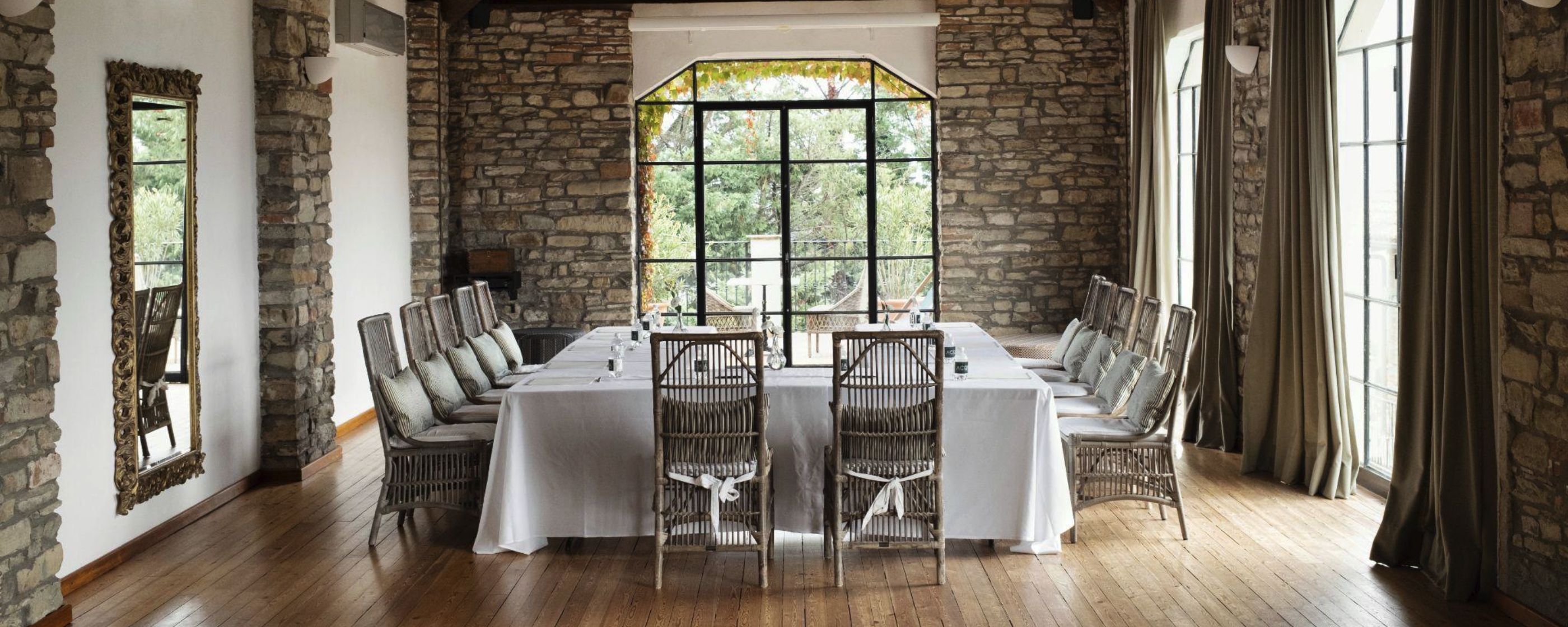 A dinner setting in a roustique room